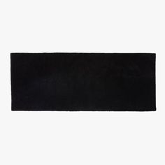 a black rug on a white background