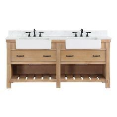 two sinks are shown in front of a white wall and wooden cabinet with black faucets