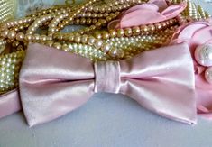 "Blush Pink Satin bow tie is perfect for weddings and special occasions. The blush pink bow tie is elegant with any suit or tuxedo. The Unisex bow ties are an excellent evening addition to any wardrobe. You will look unique and be comfortable at any special occasion. Our bow ties are made in fine satin with interfacing to give it, stability and shape. Price is for 1 bow tie. Approximate Measurements: Bow: 5\" x 2.5\" Adjustable Strap: 14\" x 19\" Bow Tie care recommended Dry Clean only. All item Pink Bow With Bow Tie Back For Wedding, Elegant Pink Bow For Gift, Classic Pink Bow Tie For Party, Elegant Pink Bow Tie For Black Tie Events, Pink Elegant Bow Tie With Decorative Bow, Pink Party Bow With Bow Tie Back, Elegant Pink Bow Tie With Decorative Bow, Pink Satin Bow Tie For Wedding, Pink Satin Wedding Bow