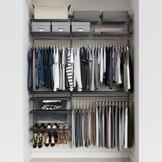 an organized closet with clothes and shoes