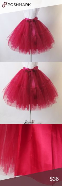 Vintage 50's Look Red Full Tulle Tutu Skirt A fun skirt in deep red tulle with 4 layers  A little thicker & stiffer tulle than the 7 layer, but holds a fullness better Center seam to give a vintage skirt look - like a high hemline Elastic waistband in satin + Matching satin ribbon sash Satin underskirt + Can be used to add fullness to a skirt One size fits most S/M/L Waist: 24 to 30 inches  Length: 21 inches Bettys Closet Skirts Midi 50s Look, Tulle Tutu Skirt, 7 Layer, Tulle Tutu, Tutu Skirt, Skirts Midi, Vintage Skirt, Satin Ribbon, Deep Red