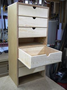 an unfinished drawer is shown in the process of being assembled