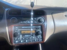 an old radio in the dashboard of a car