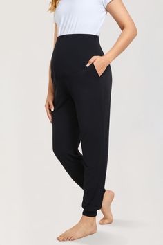 Casual Stretchy Maternity Joggers _ Black Comfortable Solid Harem Pants For Loungewear, Comfortable Loose Fit Yoga Pants For Lounging, Comfort Waistband Yoga Pants For Lounging, Comfortable Solid Color Pants For Lounging, Comfortable Pants For Lounging, Solid Color Yoga Pants With Elastic Waistband For Lounging, Full-length 4-way Stretch Sweatpants For Loungewear, 4-way Stretch Full-length Sweatpants For Loungewear, Soft Sleep Bottoms