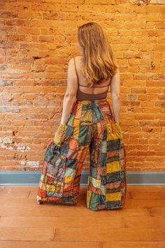 "Gorgeous handmade wide leg pants! Bohemian grunge feel with incredible intricate patchwork detail! Side pockets and 3 gorgeous colors. 2 sizes available Fit details Regular - 24-38\" waists, 28\" inseam Plus - 38-58\" waists, 28\" inseam" Hippie Wide Leg Patchwork Pants, Hippie Wide-leg Patchwork Pants, Bohemian Cotton Bottoms With Patchwork, Wide Leg Patchwork Bottoms For Festival, Bohemian Wide Leg Bottoms With Patchwork, Festival Patchwork Wide Leg Bottoms, Bohemian Cotton Bottoms With Floral Patchwork, Bohemian Cotton Pants With Floral Patchwork, Multicolor Cotton Wide Leg Hippie Pants