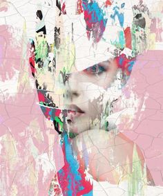 a woman's face is covered in multicolored paint