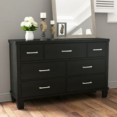 This 7-drawer dresser brings clean lines and neutral tones to your bedroom, entryway, or anywhere else you need some extra storage. It's built from engineered wood with a finish that highlights the wood's natural grain, and it features a vertical rectangular silhouette. The seven drawers offer plenty of room for organizing everything from socks to sweaters. Included silver metal hardware rounds out the understated traditional look. Plus, a wall anchor is included for added safety. PERFECT FOR SM Living Room Storage Unit, Drawers For Closet, Closet Dresser, Dresser Organizer, Rustic Dresser, Dresser In Closet, Dresser For Bedroom, Closet Drawers, 7 Drawer Dresser