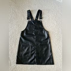 All Orders Ship Within 1-2 Business! Girls Faux Leather Overall Dress Condition: Brand New Without Tags Color: Black Size : 9/10 Measurements: Chest- 27-28.5in | Waist- 24-25.5in | Hips- 28.5-30in | Height- 53-55in Black School Dresses For Fall, Black Dresses For School In Fall, Black Fall Dresses For School, Trendy Black Faux Leather Dress, Forever 21 Black Mini Dress For Fall, Leather Overall Dress, Pinafore Leather Dress, Leather Pinafore Dress, Forever 21 Sleeveless Fall Dress