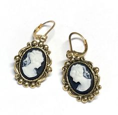 Cameo earrings.   Lovely black and white  profile resin cameos in an antiqued gold  plated setting. These lightweight earrings have gold plated lever backs and have an overall length of 1 1/2 inches long.  A great gift for girlfriend or just for yourself. A gift box is included. Mauve Jewelry, White Profile, Black Cameo, Sunflower Jewelry, Cameo Earrings, Cameo Jewelry, Gauged Earrings, Palm Beach Gardens, Beach Gardens