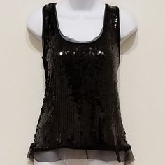 Black Sequined Tank Top With Tulle Ruffle Hem. Modified Racer Back. Size Large. New With Tags - Never Worn. Approximate Flat Measurements: Bust-19". Smoke Free/Pet Free Home. For The Security And Peace Of Mind Of The Buyer And Seller, All Items Are Photographed And Videotaped As They Are Packaged For Shipping. Black Sequined Tank Top, White Crop Top Tank, Graphic Crop Top, Crochet Tank Top, White Lace Top, Crochet Tank, Sequin Tank, Sequin Tank Tops, Black Lace Tops