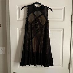 Gorgeous Free People Black Dress. Size Small, New With Tags. Sleeveless Gothic Dresses For Date Night, Black Mini Dress For Festival, Bohemian Sleeveless Mini Dress For Night Out, Chic Black Dress For Festivals, Black Sleeveless Mini Dress For Festival, Black Fitted Mini Dress For Festival, Black Sleeveless Bohemian Mini Dress, Sheer Black Festival Dress, Fitted Black Mini Dress For Festival