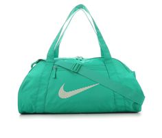 Durable and spacious is the name of the game for Nike's Gym Club Duffel Bag. Crafted with a lightweight and durable construction, this duffel bag features adjustable straps and plenty of storage space so you can always be ready for the day. This product is made with at least 65% recycled polyester fibers, Lightweight and durable ripstop fabric body, Zippered closures, Approx. 13 inch H x 20 inch W x 9 inch D, Removable shoulder strap, Snap pockets on the sides for added convenience, Nike® branding details | Unisex Nike Gym Club Duffel Bag in Stadium Green Green Shoulder Bag With Logo, Green Logo Shoulder Bag, Functional Green Rectangular Gym Bag, Sporty Everyday Shoulder Bag With Logo, Functional Green Bags With Reinforced Handles, Functional Shoulder Bag With Logo, Nylon Sports Bags, Green Sporty Rectangular Duffle Bag, Sporty Bags With Logo For Daily Use