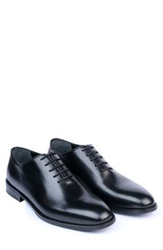 Handsome, polished and easy to wear, this wardrobe-staple leather oxford sports minimal detailing to give it maximum versatility across your formal wardrobe. Lace-up style Leather upper and lining/synthetic sole Made in Turkey Classic Oxford Shoes With Brogue Detailing For Work, Modern Brogue Oxfords For Workwear, Black Oxfords For Work, Sleek Black Oxfords For Business Casual, Leather Plain Toe Oxford Shoes For Work, Fitted Leather Sole Oxford For Workwear, Modern Black Oxfords For Formal Occasions, Modern Black Formal Oxfords, Fitted Leather Sole Oxford Shoes For Work