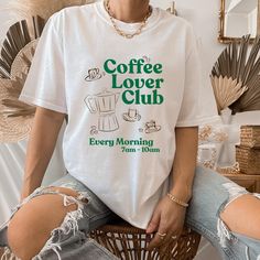 Coffee T-Shirt, Coffee Club Lover Shirt, Coffee, Oversize Graphic Tee, Lover Gift, Coffee Club Shirt, Comfort Colors® Tee, Aesthetic T-Shirt   🦋 Product Details   - Printed image(s)  - Unisex t-shirt  - Ribbed knit collar  - Features a crewneck  - Loose fit for a comfortable feel - Please check all photos for details   ☀️ Sizing and Colors  - Please refer to sizing and color charts in the images - Runs true to size   🌸 Fabrication - 100% cotton - Medium fabric (6.1 oz/yd²) - Double-needle stitched collar, shoulders, armholes, cuffs and hem - Signature sewn-in twill label   🌱 Care Instructions  - Turn inside out and machine wash cold on delicate cycle  - Dry on low heat setting or air dry  - Do not dry clean  - Do not bleach  - Do not iron directly on design   🌹 Processing and Shipping Coffee Shop Shirt Design, Coffee Shop Shirt, Oversize Graphic Tee, Coffee Club, Oversized Graphic Tee, Club T Shirt, Aesthetic T Shirts, Coffee Tshirt, Club Shirts