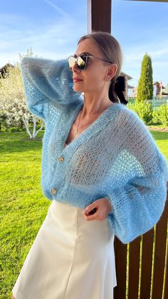 Light blue Mohair Cardigan Kid Mohair cardigan Wool sweater Luxury Cardigan Mohair Jacket Wedding Wrap Mohair Bridal Jacket Thin, transparent, and airy cardigan- just like a delicate spiderweb.  Lightweight sweater made from Italian yarn. It is very delicate and weightless. Stylish kidmohair cardigan will suit any outfit. Suitable for sensitive skin. Will be a great addition to your outfit for everyday, leisure, celebration, wedding or travel. Perfect blending of fabrics not only promises a luxu Winter Mohair Soft Knit Outerwear, Cozy Mohair Soft Knit Outerwear, Cozy Hand Knitted Mohair Cardigan, Handmade Mohair Cozy Cardigan, Brioche Knitting Patterns, Blue Hand-knitted Mohair Sweater, Hope Is The Thing With Feathers, Brioche Knitting, Bridal Jacket