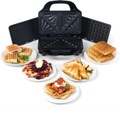 the waffle maker has five plates of food on it