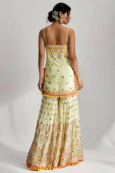 Whether you're attending a festive occasion, a wedding celebration, or a cultural event, the sonia strappy sharara set will make you stand out with its intricate embroidery, sequins and colorful embellishments. It embodies the perfect fusion of traditional craftsmanship and contemporary fashion, making it a unique and exquisite choice for those who appreciate timeless beauty. Brocade Lehenga, Kurta Cotton, Desi Clothes, Sharara Set, Intricate Embroidery, Cultural Events, Wedding Celebration, Contemporary Fashion, Indian Wear