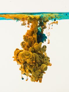 yellow and blue substance floating in water