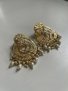 Material: gold plated silver  Gems: glass and faux pearls Size: approximately 3 inches in diameter  Style: pushin  Perfect statement earrings for Pakistani and Indian weddings Chandbalis Earrings, Desi Jewellery, Desi Jewelry, Simple Necklace Designs, Pakistani Jewellery, Pakistani Earrings, Saint Paul Mn, Dress Indian, Pakistani Jewelry