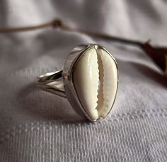 Cowrie Shell Ring, Handmade Ring, Natural Stone, 925 Silver Ring, Women Ring, Designer Ring, Thumb Ring, Gemstone Ring, Silver Jewelry All the jewelry made of 925 Sterling silver Handmade Jewelry We make the jewelry with lots of love 100% Quality Jewelry You will get well finished jewelry Shipping Details: We ship the order through Dhl, UPS shipping service which is track able. We accept the expedited shipping service. IF YOU HAVE ANY QUESTION PLEASE FEEL FREE TO ASK Nickel Free White Toe Ring, Handmade White Sterling Silver Rings, Handmade White Toe Ring, Handmade Sterling Silver Stackable White Rings, Handmade White Sterling Silver Stackable Rings, Handmade White Open Stackable Rings, Handmade White Stackable Open Rings, Handmade White Stackable Rings As A Gift, Handmade White Stackable Rings As Gift