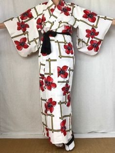 "A cute vintage Yukata Kimono dress from Japan.  Made of light cotton for warm summer days.  Wear this as a dress, robe, beach cover or dressing gown.  Sash sold separately. Fits a women's size S. MATERIAL:  100% Cotton.  Unlined. PATTERN:  Oversized flowers and lattice. Color:  White with black, red & yellow design. CONDITION:  Used vintage.  A few light stains (see photos). Sash NOT included. Kimono sash sold separately. My shop: https://kimonomemoirs.etsy.com. SIZE: Women's SMALL Kimono. (Model is 5'7\" wearing 1.5\" platform sandal) Wingspan- 49 inch (124.5 cm) across the top, sleeve end to sleeve end. Length- 57.5 inch (146 cm) from neckline to bottom of robe. Sleeve length- 17.5 inch (45 cm) from top to bottom of sleeve. Width- 22 inch (56 cm) measured arm-pit to arm-pit across the b Historical Kimono, White Yukata, Small Kimono, Japanese Dress Kimono, Yukata Women, Japanese Wedding Dress, Oversized Flowers, Floral Dress Long, Cute Kimonos