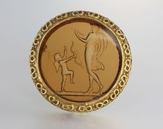 Goldette Venus Cupid Brooch Intaglio Cameo - Etsy 1970s Jewelry, Copyright Symbol, Turtle Brooch, Spartanburg Sc, Circle Jewelry, Victorian Revival, Faux Stone, Cat Pin, The Circle