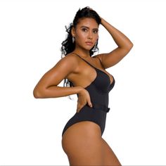 Nwt Good American Show Off One-Piece Belted Swimsuit Size: Small (1) Color: Black Optional Self-Belt Convertible, Adjustable Shoulder Straps Lined Cups With Removable Padding Underwire Cups Shell: 82% Nylon/18% Elastane Lining: 88% Polyester/12% Elastane Wash Cold Get Ready To Turn Some Heads At The Beach In This Fiercely Stylish One Piece From Good American. Underwire Cups And An Adjustable Belted Waist Give You Just The Right Fit And Support. Smoke Free Home Ships Same Day Or Next Business Day Party Swimwear Shapewear, Solid Color Party Swimwear With Shapewear, Solid Color Party Swimwear Shapewear, Elegant Solid Swimwear For Club, Elegant Swimwear For Club, Elegant Club Swimwear Solid Color, Elegant High Waist Lined Swimwear, Elegant Solid Color Club Swimwear, American Swimsuit