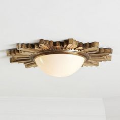 the light fixture is made out of wood