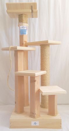 the cat tree is made out of wood