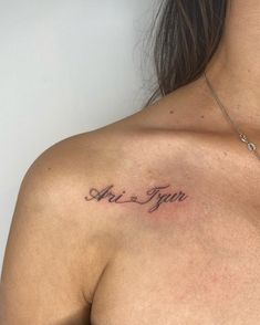 a woman with a tattoo on her chest