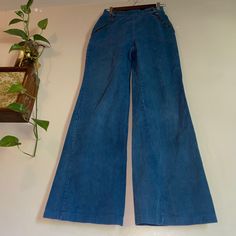 vtg 1970s double zipper flare leg medium wash bell bottom jeans indigo denim wide leg high waisted mom jeans retro side zip jeans hippie mod 100% cotton two Zippers  up the front Great condition ! only areas of stain or damage are the leg holes near both hems. one rust spot near the waist  Measurements lying flat: Waist:12.5" Hips:17.5" Inseam:31" Rise:12" High Waist Denim Blue Flare Jeans With Zipper Closure, High Waist Denim Blue Flare Jeans With Zipper, Medium Wash Wide Leg Jeans With Zipper Closure, Medium Wash Retro Pants For Fall, Medium Wash Wide Leg Jeans With Zipper, Retro Medium Wash Pants For Fall, Wide Leg Medium Wash Jeans With Zipper, Retro Medium Wash Flare Bottoms, Retro Flare Bottoms In Medium Wash