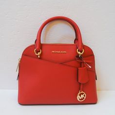 Michael Kors Jet Set Travel Medium Dome Xcross Satchel Shoulder Crossbody Bag Saffiano Leather Red Flame 100% Authentic Retail: $428.00 Plus Tax One Black Mark On Near Zipper Other Than That Perfect Condition Tag Said Medium But The Bag Is Actually Small **Please See The Measurement For The Size* No Dust Bag Michael Kors Logo At Front 1 Slip In Pocket At Front Zip Top Closure Gold Toned Hardware Custom Fabric Lining 1 Zipper Pocket 2 Slip-In Pockets 11.5" (L) X 8.5"(H) X 4.5"(D) Strap: Double Ha Designer Red Saffiano Leather Bag, Red Saffiano Leather Evening Bags, Red Saffiano Leather Bag With Gold-tone Hardware, Red Saffiano Leather Shopping Bag, Red Saffiano Leather Top Handle Bag, Red Saffiano Leather Bag For Everyday Use, Red Saffiano Leather Bag For Daily Use, Michael Kors Selma Medium, Studded Handbag