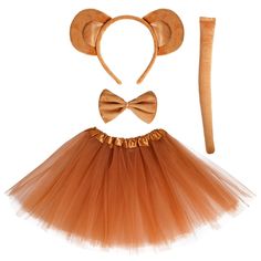 an orange tutu skirt and headband with ears on the top is next to a wooden stick