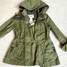 Cute Women Light Parka Jacket Sz Xs Brand New Trendy Cold Weather Utility Jacket With Pockets, Trendy Utility Jacket For Cold Weather With Pockets, Trendy Utility Jacket With Pockets For Cold Weather, Fitted Casual Parka For Cold Weather, Casual Fitted Utility Jacket For Winter, Trendy Cotton Parka For Fall, Trendy Utility Jacket For Cold Weather In Fall, Casual Parka For Cold Weather, Trendy Spring Utility Jacket For Outdoor