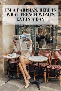 a woman sitting at an outdoor table reading a newspaper with the caption i'm a parisian, here is what french women eat in a day