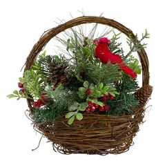 a red bird sitting on top of a basket filled with greenery and pine cones