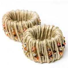 two pieces of rope with beads on them