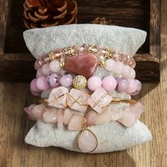 5 Stackable Double Durable Crystal Strong Stretchy String Beaded Bracelets 1 Gold Plated Bangle With Gold Plated Wire Wrap Around 3 Irregular Natural Rose Quart Stones, Adjustable Size Pink Stackable Beaded Bracelets For Crafting, Elegant Pink Stretch Bracelet With Natural Stones, Adjustable Pink Stretch Bracelet With Natural Stones, Pink Bohemian Beaded Crystal Bracelet, Bohemian Hand-strung Rose Quartz Beaded Bracelets, Spiritual Hand-strung Rose Quartz Stretch Bracelet, Adjustable Rose Quartz Stretch Bracelet, Spiritual Style, Gold Plated Bangles, Strung Beads