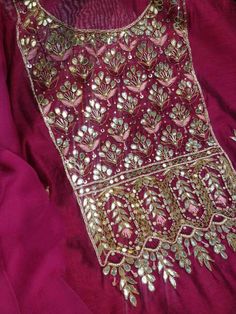 Item Overview ATHARVA Hand Embroidery Salwar Kameez w/Embroidery Neck Maroon/Banarsi Silk Dupatta/Gota Patti/ Custom Stitch/Anarkali/Patiala/ Dno. CH1556 Fabric: * Shirt- Chanderi Silk - Embroidered Neck- Maroon - 2.5 Mts Beautiful Hand Embroidery * Dupatta: Banarsi Silk Dupatta-Tilla Border Dupatta- 2.5 Mts- Latkans Tassels- (Motifs may wary) * Bottom Santoon Silk 2.5 Mts. Excusive Hand Embroidered Party Wear Punjabi Suit. Customization: * Fabrics Customization: Designs Can be made in different Festive Gota Work Dola Silk Kurta, Anarkali Salwar Kameez With Dupatta For Festive Occasions, Festive Kurta With Gota Work In Traditional Drape, Traditional Drape Kurta With Gota Work For Festive Occasions, Traditional Sharara With Gota Work And Straight Kurta, Festive Salwar Kameez With Gota Work, Traditional Sharara With Gota Work, Navratri Anarkali Set With Dupatta In Chinon, Straight Kurta With Gota Work In Dola Silk