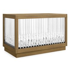 a wooden crib with clear glass in the top section and bottom section, on an isolated white background