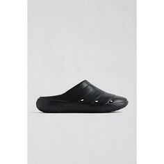 Essential Slip On Clog By Adidas With Tonal 3-Stripe Accents At The Perforated Upper. Fitted With A Molded & Cushioned Midsole And Finished With Textured Tread At The Outsole. Black Low-top Clogs With Cushioned Footbed, Black Low-top Outdoor Clogs, Black Low-top Clogs For Outdoor, Sporty Black Clogs For Streetwear, Comfortable Black Clogs For Streetwear, Adidas Synthetic Slip-on Clogs, Sporty Black Clogs With Cushioned Footbed, Black Slip-resistant Sports Clogs, Black Slip-resistant Clogs For Sports