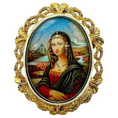 There are many different styles of vintage portrait pendant/ brooches on the market, however, this Mona Lisa style is one of the most unique. Framed in a lacey looking, oval shaped, 18K yellow gold frame, the subject of this portrait is posed with crossed hands in front of a landscape backdrop that looks very much like the famous portrait of the Mona Lisa. The three diamond accents weigh an approximate total .02ct. The pendant measures 1 5/8 inches long (including the bale) by 1 1/16 inches wide. The brooch (without the bale) measures 1 3/8 inches long by 1 1/16 inches wide. Equipped with a single pin across the back and a fold down bale that is stamped 750 (for 18K gold ). Gross weight 15.89 grams. Lisa Style, Famous Portraits, Portrait Vintage, Vintage Portrait, Vintage Portraits, Gold Frame, Different Styles, Gold Diamond, Mona Lisa