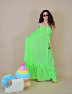 Green Flowy Sundress Beach Dress, Green Flowy Sundress For The Beach, Green Sundress Maxi Dress For Vacation, Flowy Green Sundress For Beach, Flowy Green Sundress Beach Dress, Green Maxi Sundress For The Beach, Green Beach Dress For Holidays, Green Maxi Sundress For Beach, Green Beach Sundress