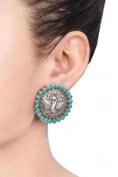 Silver toned stud earrings with peacock motif carvings and stone studded hem.
Type: Stones
Composition: Silver
Color: Silver
Handcrafted earrings
Peacock motifs
Closure: Push back
Note:  The jewellery is handcrafted therefore variations may occur - Aza Fashions Peacock Motifs, Peacock Motif, Stud Earrings Silver, Silver Jewelry Earrings, Jewellery Earrings, Stone Studs, Earrings Stud, Handcrafted Earrings, Online Earrings