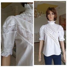 "70s Victorian Clothing Victorian Blouse S Vintage high neck blouse puffy sleeve blouse white Blouse womens blouse Edwardian shirt retro lace Blouse 1P 100%-cotton Please refer to photos for details of condition. Condition: good vintage Measurements: Length: 58 cm/ 22.8\" Sleeve : 28 cm/11\" Shoulder to shoulder: 34 cm/13.4\" Bust: 94 cm/37\" Waist 85 cm/33.5\" Tag size: 38 S/M note The color on the pictures may vary due to monitor settings and light reflections. Ready to ship Please do not hesi White Fitted Cottagecore Top, Short Sleeve Cotton Blouse With Lace Patchwork, Short Sleeve Lace Blouse With Broderie Anglaise, Lace Blouse With Broderie Anglaise Short Sleeves, Cotton Blouse With Lace Patchwork And Short Sleeves, Vintage Fitted Blouse With Lace Patchwork, Vintage Fashion Spring Blouse With Lace Trim, Vintage Lace Collar Top For Spring, Fitted Vintage Blouse With Lace Patchwork