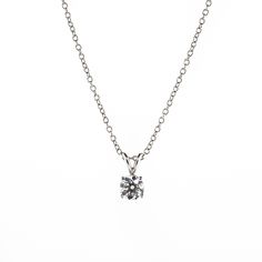 There's something classic and luxurious about a high quality single diamond hanging around your neck. This diamond solitaire pendant necklace is made from solid platinum and measures 18" long. The diamond is GIA certified as an all-natural .92ct G/VS2 round brilliant cut diamond securely set in a four prong basket style setting. This necklace comes with the GIA certificate and a free official appraisal showing the value of the necklace at $9650. Formal Solitaire Necklace With Brilliant Cut Round Pendant, Formal Brilliant Cut Solitaire Necklace With Round Pendant, Formal Brilliant Cut Round Pendant Solitaire Necklace, Lab Grown Diamond Solitaire Pendant Necklace, Timeless Platinum Solitaire Necklace With Round Pendant, Timeless Solitaire Pendant Necklace In Brilliant Cut, Timeless Solitaire Pendant Necklace With Brilliant Cut, Timeless Solitaire Necklace With Brilliant Cut Pendant, Luxury Diamond Solitaire Necklace With Round Pendant