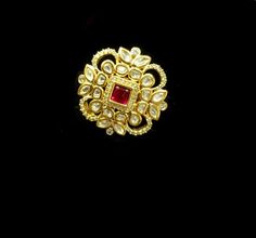 Sabyasachi inspired uncut Polki Kundan designer ring. Gold plated Combination of uncut Polki Kundan, semi precious stones and zircon  Available in 3 different colours  Ruby, emerald green and in gold. Adjustable ring  If have any queries please ask Unique Wedding Jewelry With Stone Work, Elegant Festive Ring With Intricate Design, Festive Jewelry With Stone Work, Unique Meenakari Jewelry For Wedding, Temple Jewelry Style Rings With Stone Setting For Festivals, Elegant Gold Ring With Stone Work, Temple Jewelry Ring With Stone Setting For Festivals, Elegant Rings With Stone Setting For Festivities, Elegant Festive Rings With Stone Setting