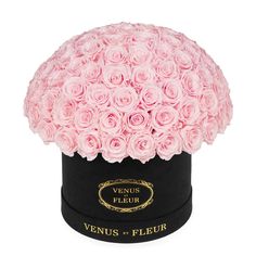 a black box with pink roses in it