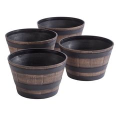 four black and brown striped cups sitting next to each other