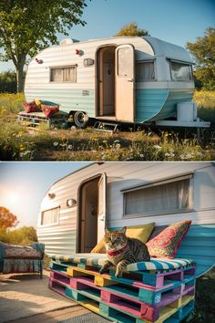 a cat sitting on top of a couch in front of a parked camper trailer